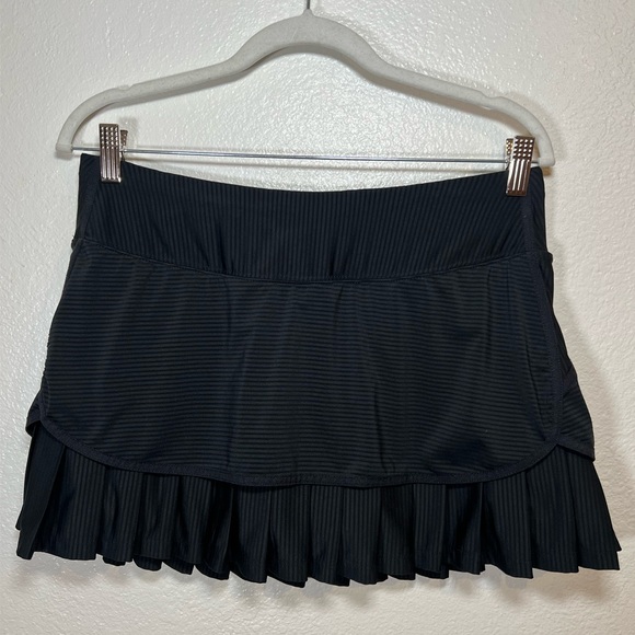 Athleta Dresses & Skirts - Athleta Women’s Good Match Skort Black Pleated Pocket Skirt Shorts M Tennis Logo